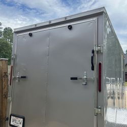 Silver Mist Tandem 6×12 Cargo Trailer A New 6×12 Enclosed Trailer Standard Features Include: 1.) V-Nose Front (Extra Space) With Solid Wall Constructi
