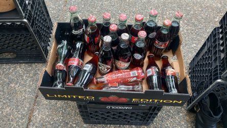 Coca cola glass bottles full, vintage, collectable