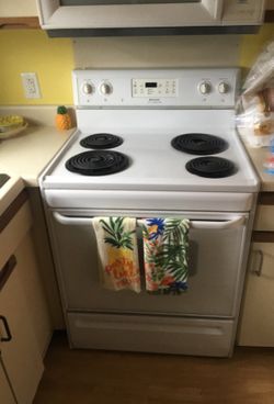 Frigidaire Range and ge dishwasher white