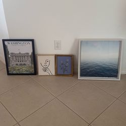 Various Photos, Paintings Frames And A Mirror
