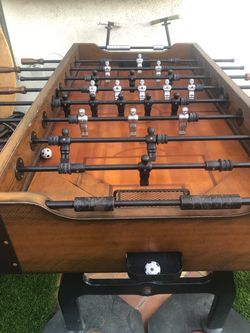 Top-of-the-line Foosball table / cover / 3 balls by Well Universal - very solid/sturdy. Must come with truck/suv to HB, OC
