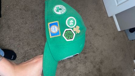 Brand new Celtics hat with 3 pins patch
