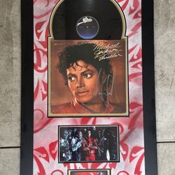Certified authentic Michael Jackson signed “Thriller” (Single) LP collage