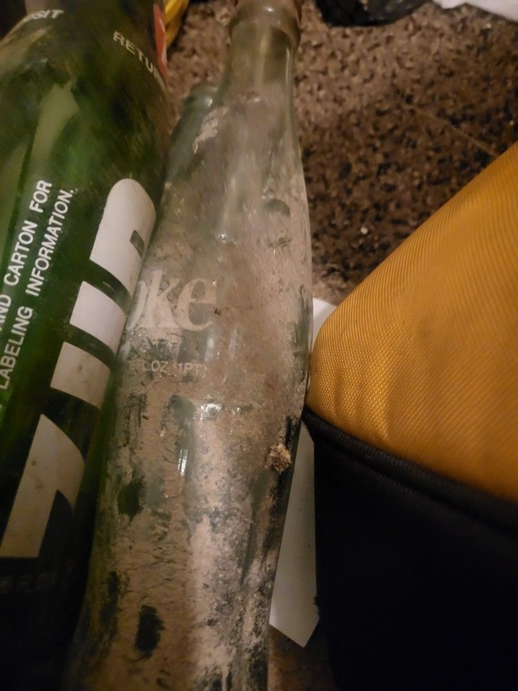 Old 7UP AND COKE BOTTLES