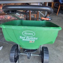Turf Builder EdgeGuard DLX Push Broadcast Spreader
