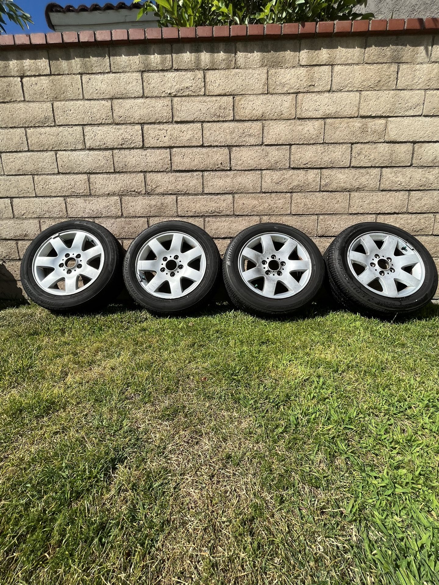 BMW E46 stock wheels 16x7 et 47 (style 45 5x120 72.56 cb) with Bridgestone Tires 205/55/16                                         BMW E36 E46 E90 E92