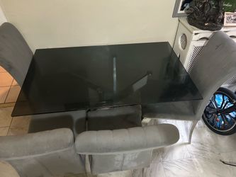 Tinted 3D glass table with chairs