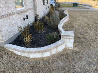STONE WORK/FLOWER BEDS