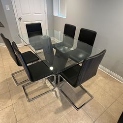 Glass Table & 6 Chairs. 