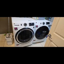 GE FRONT LOAD WASHER AND DRYER COMBO