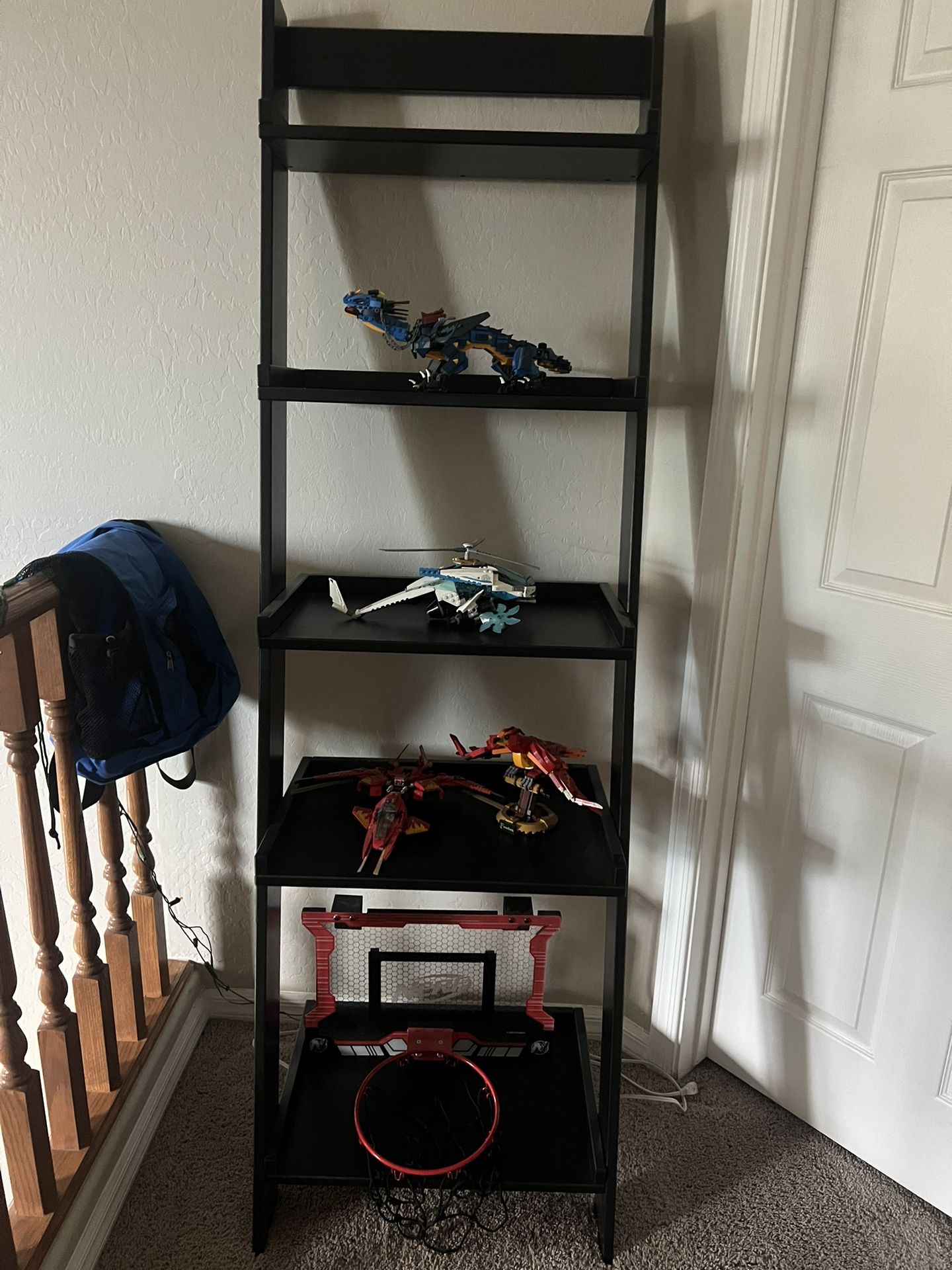 Bookcase With legos And Over The Door Basketball Hoop