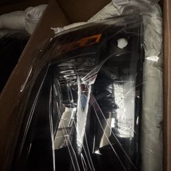 09-18 RAM 1500 Headlights 