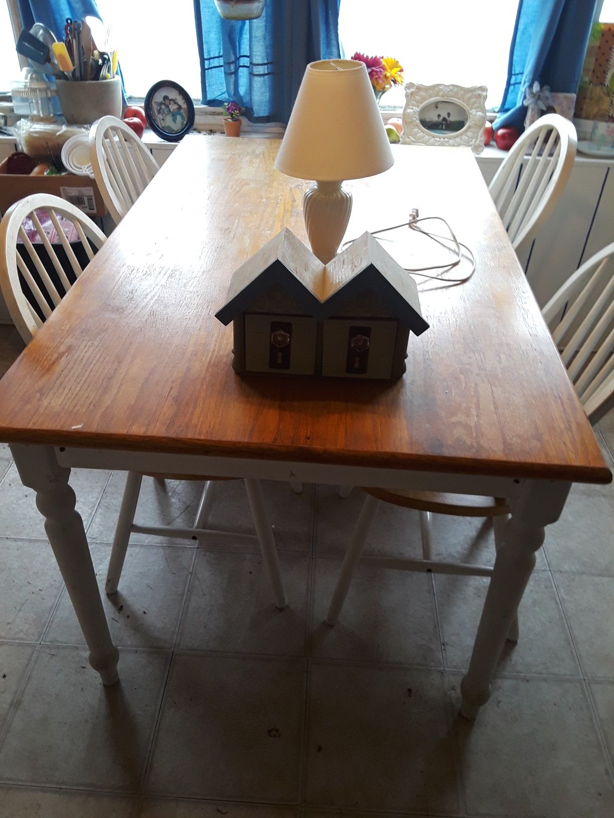 Pending pick up ×5feet kitchen table with with four chairs and small lamp and with small little tree house for free