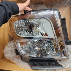 New OEM Nissan Titan Headlight