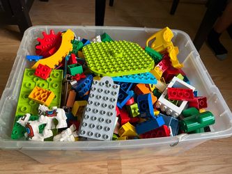 Container of DUPLO Legos