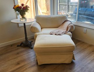 Beige chair with ottoman
