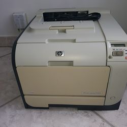 HP Color LaserJet CP2025 Printer.  Impresora laser a color HP 2025