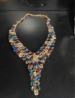 Multicolored rhinestone necklace has minor blemish but selling cheap at $30 due to that blemish, was $50