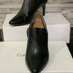 Women's 10M Calvin Klein Joanie Deep Black Cow Silk  Ankle Booties