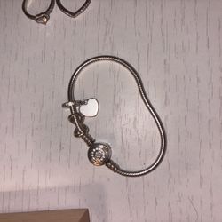 pandora rings and bracelet with charms 