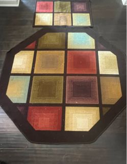 Two matching multi-color rugs