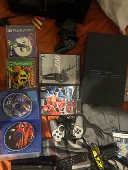 PlayStation 2 with 2 controllers and