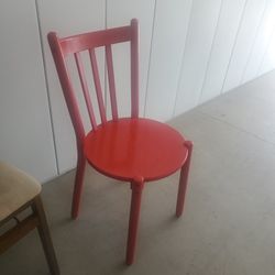 red wooden chair