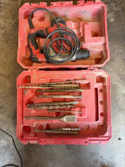 Milwaukee Hammer Drill with multiple heads