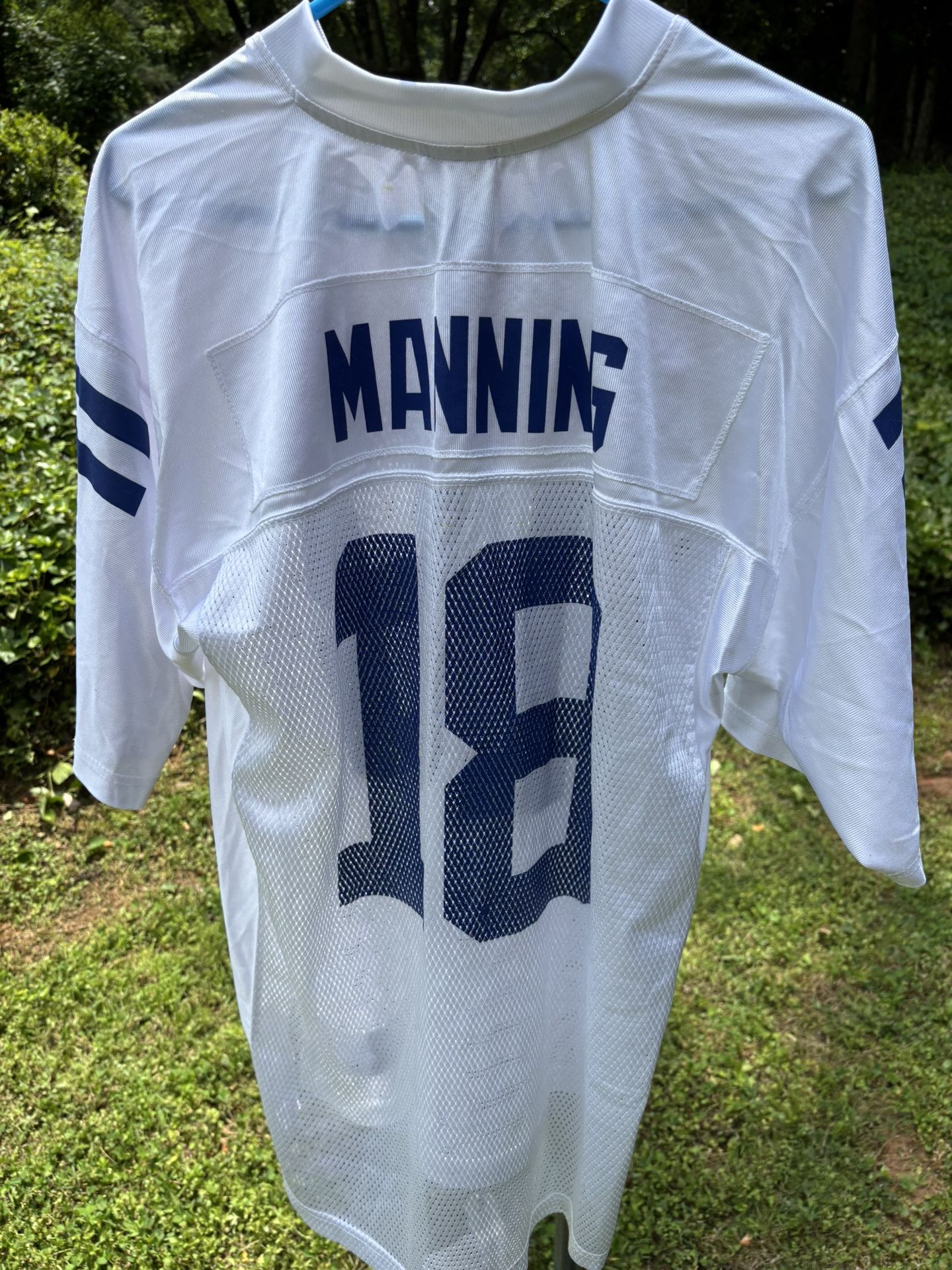 white Peyton Manning #18 Reebok NFL Indianapolis Colts jersey, likely from the 2000s era.
