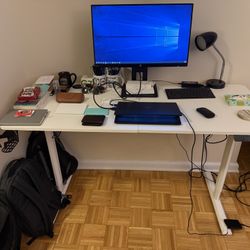 Adjustable Desk With Electric Motor