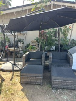Patio Chais And Umbrella