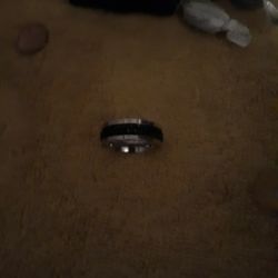 Silver Ring With Black In The Middle And Good Condition Okay