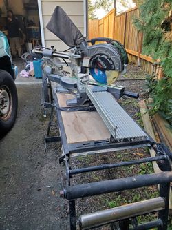 Hitachi 8 1/2" sliding compound miter saw on stand