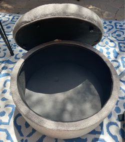 24” Round tufted round storage ottoman.