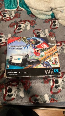 Wii U with three games and Mario kart eight pre-install installed
