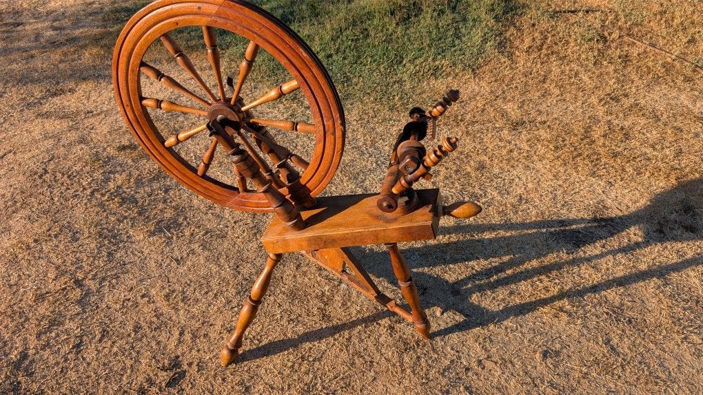 Antique Wooden Saxony Style Spinning Wheel with Turned Legs and Large Flywheel