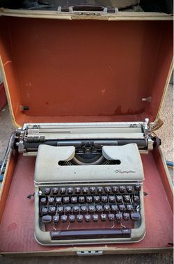 Olympia Vintage Portable Typewriter with Case