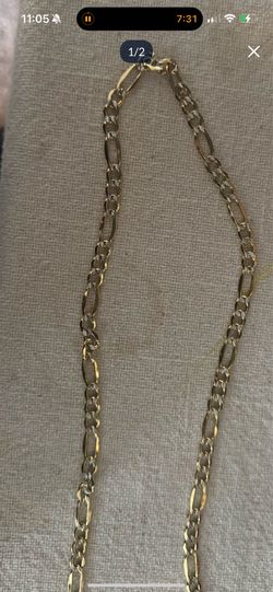 14k gold Figaro chain diamond-cut finishes.