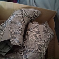 Snake Skin Print Heeled Bootie.  New $15 Each
