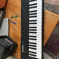 Alesis VI49 49-Key USB-MIDI keyboard controller.