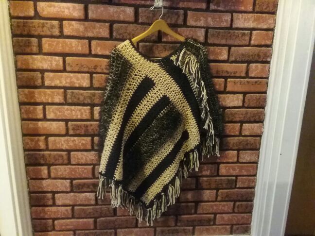 New, one of a kind, ladies or teenagers poncho