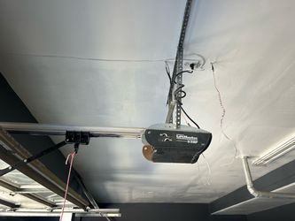 Garage Door Opener Spring Off Track Replace Adjustment And Parts