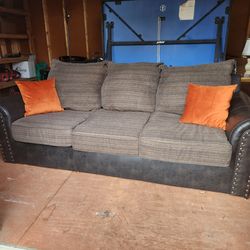 Leather and cloth sofa bed