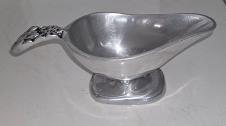 Vintage Cast Aluminum Gravy Boat, 8" long, 3" wide, 3" tall. Ornate floral embossed handle, solid cast metal, pedestal base. No dents or cracks, great