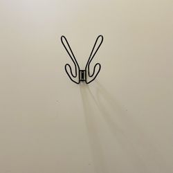 Nice double hanger. High quality  covered metal. Like new condition.