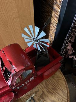 Really cool antique cast iron truck and plane great for display in man cave or collectibles.21” long
