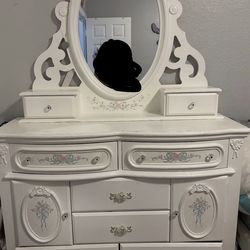 white dresser and night stand