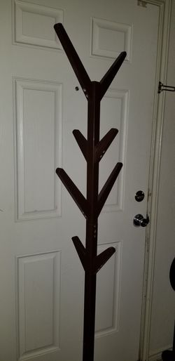 Wood coat hanger