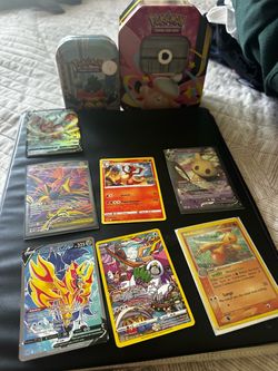 Pokémon TCG Card with Tins