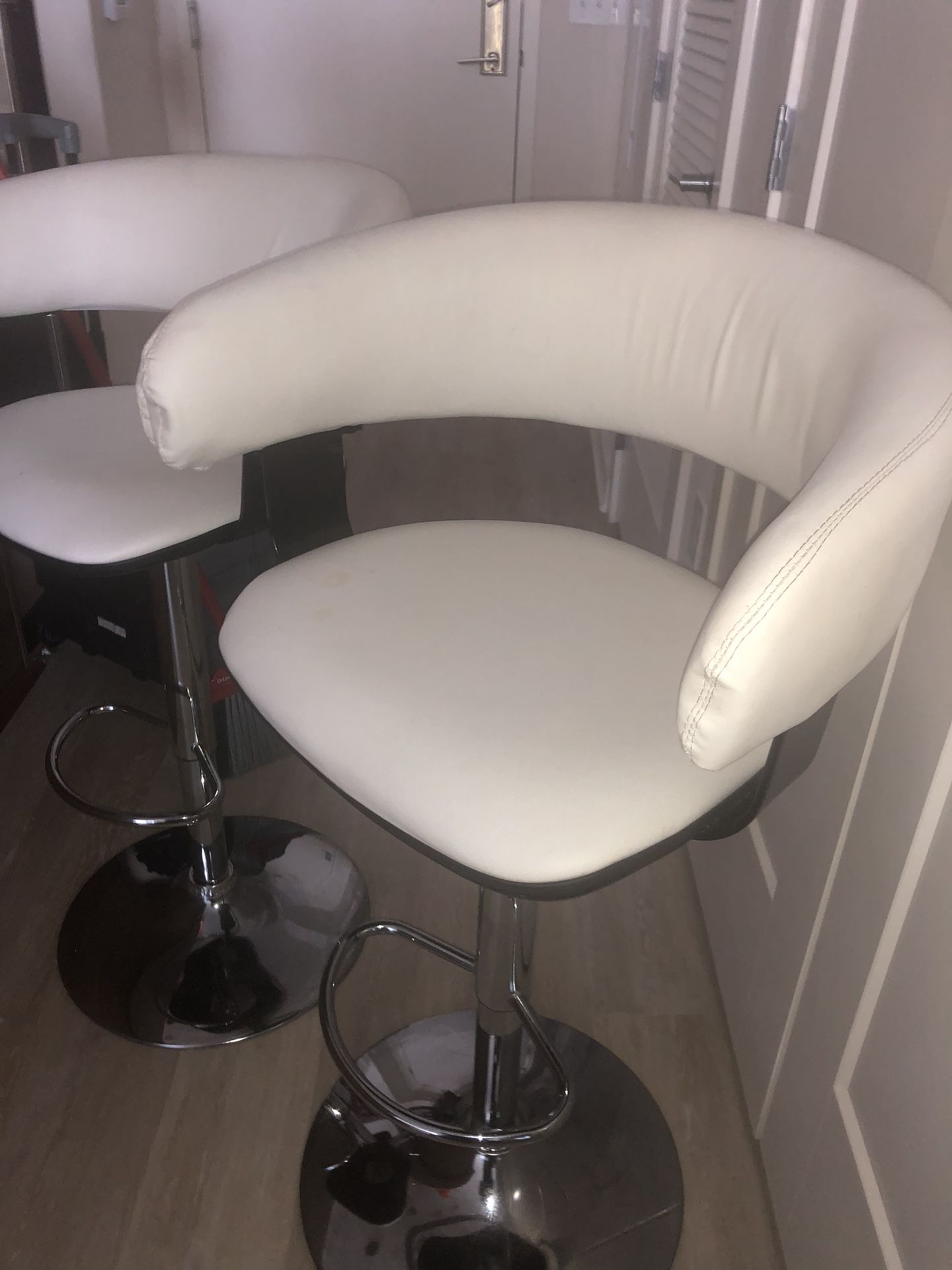 White leather bar stools